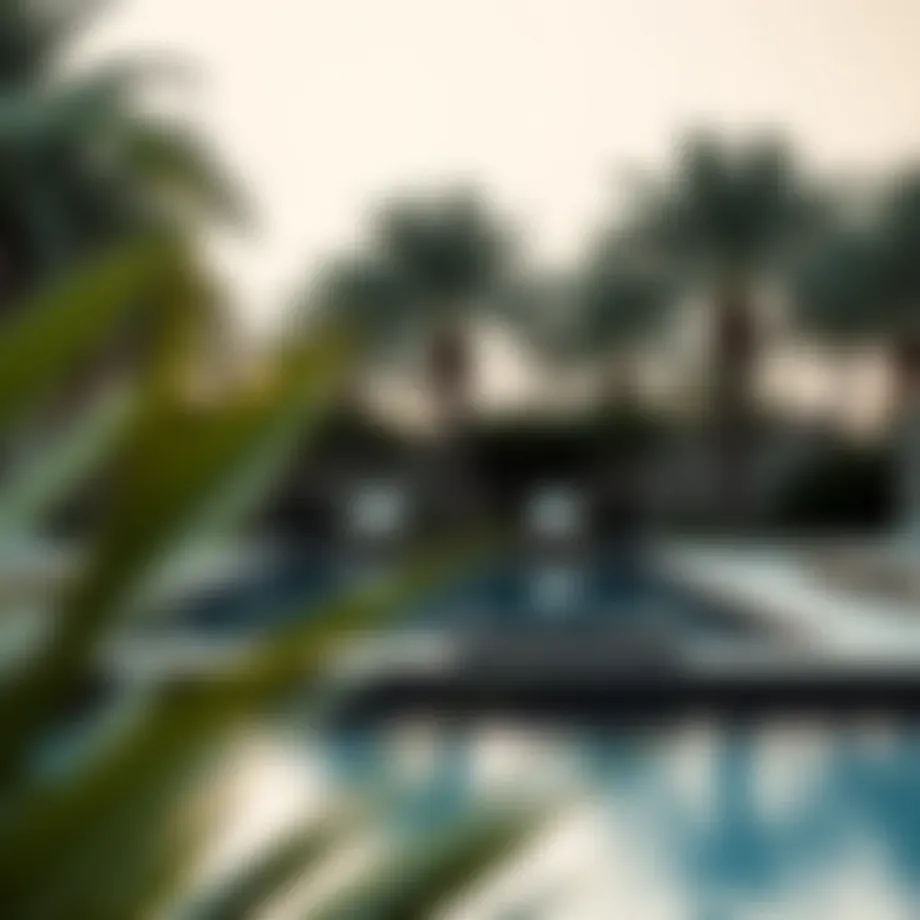 A luxurious private pool surrounded by palm trees in a serene resort.